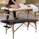 2-Section Wooden Massage Table inSPORTline Orashi (186 × 60 × 62.5–85.5 cm) - Cream - Black